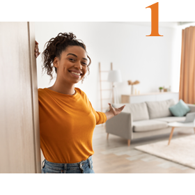 woman wiping down surface in apartment